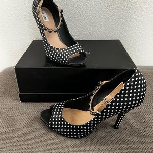 Size 7.5 polka dot heel with ankle strap.